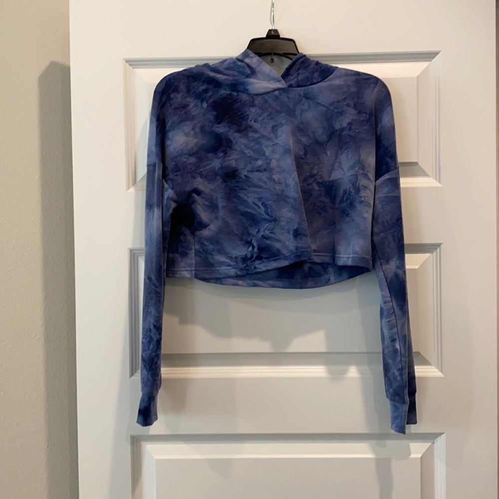 Blue tie dye long sleeve crop top with hood.